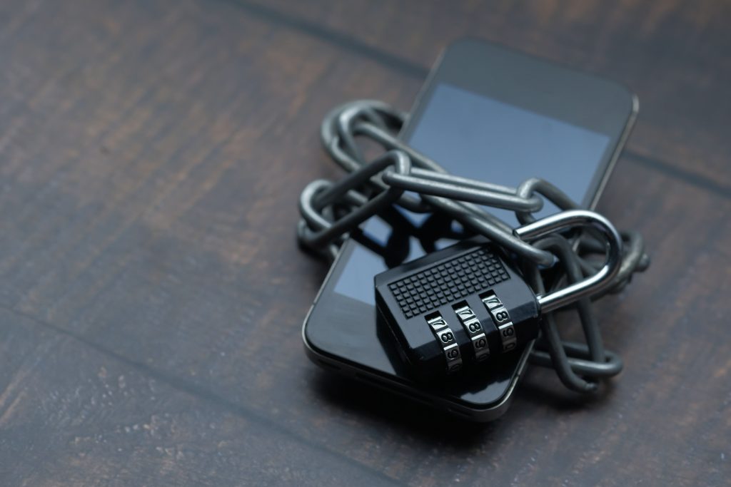 padlock on smartphone Padlock representing SharePoint and OneDrive permission security